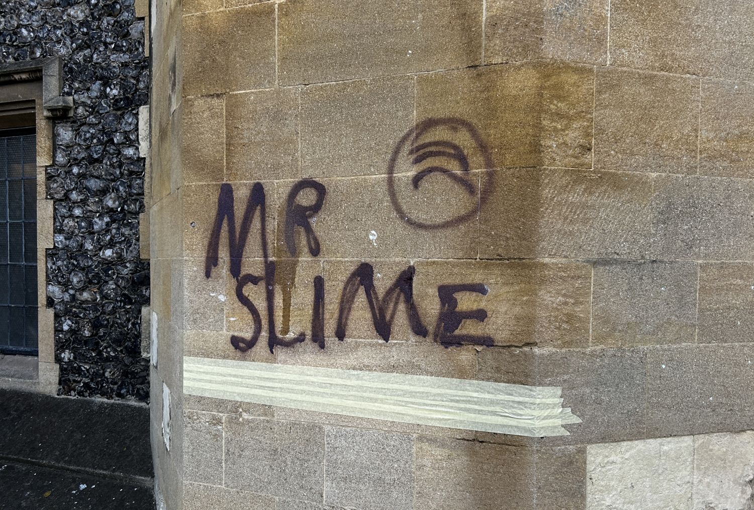 Graffiti tag saying 'Mr Slime'