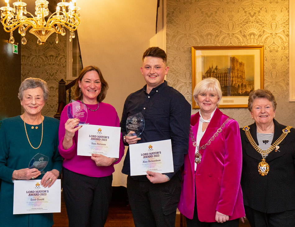 Award winners Enid Gould, Sian Pettman and Alex Richardson standing with their awards next to Lady Mayoress Di Baldock and Lord Mayor Cllr Jean Butcher at the awards ceremony