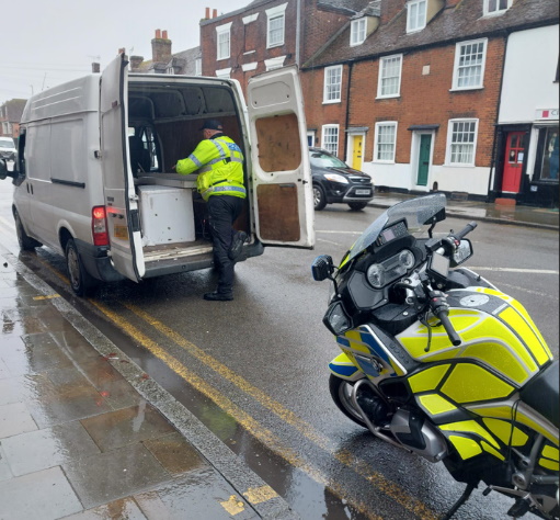 Police stop a van carrying waste during the joint operation