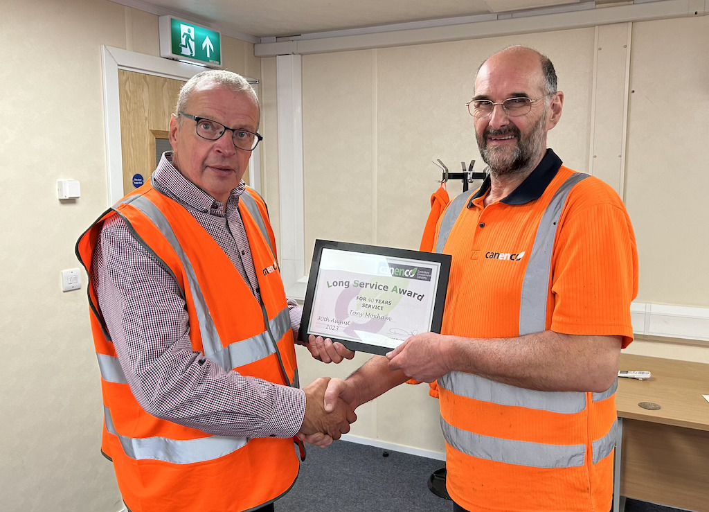 Tony accepting his long service award from Director of Canenco, David Maidman