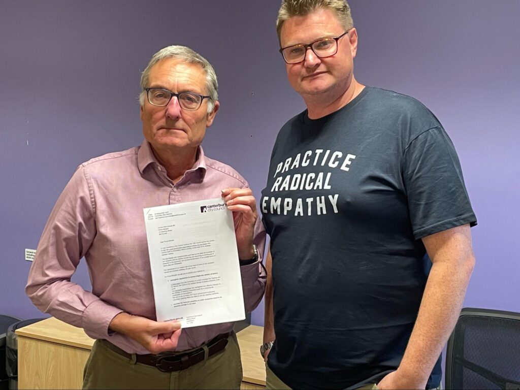 Leader of Canterbury City Council, Cllr Alan Baldock, and Cabinet Member for Coastal Towns, Cllr Chris Cornell, holding the letter to Rishi Sunak