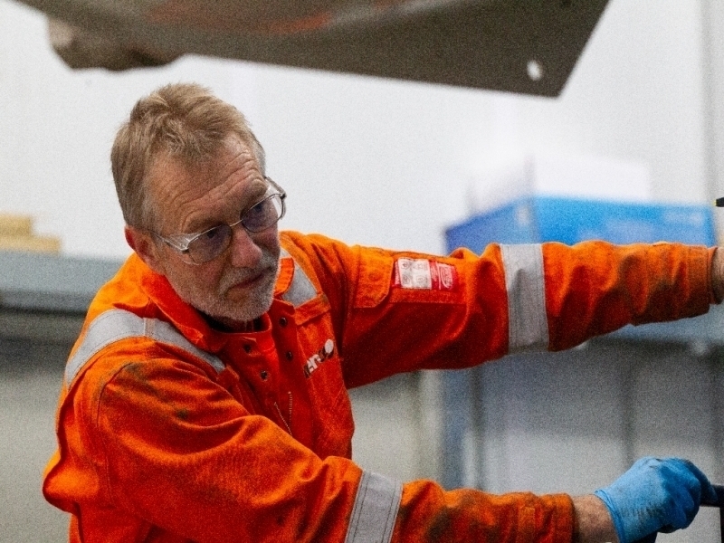 Pete Smith working on a Canenco waste lorry