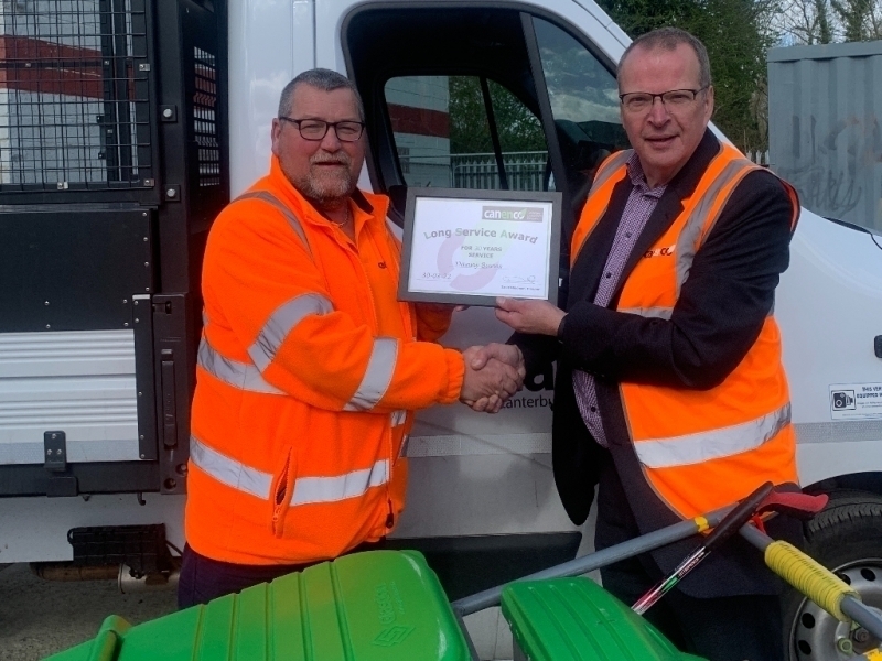 Danny Burns receiving his Long Service Award from David Maidman